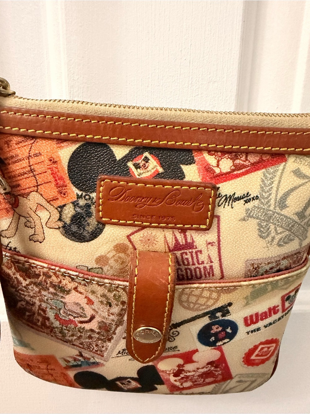 Vintage Dooney & Bourke Beige Canvas Disney Stamp Crossbody Bag